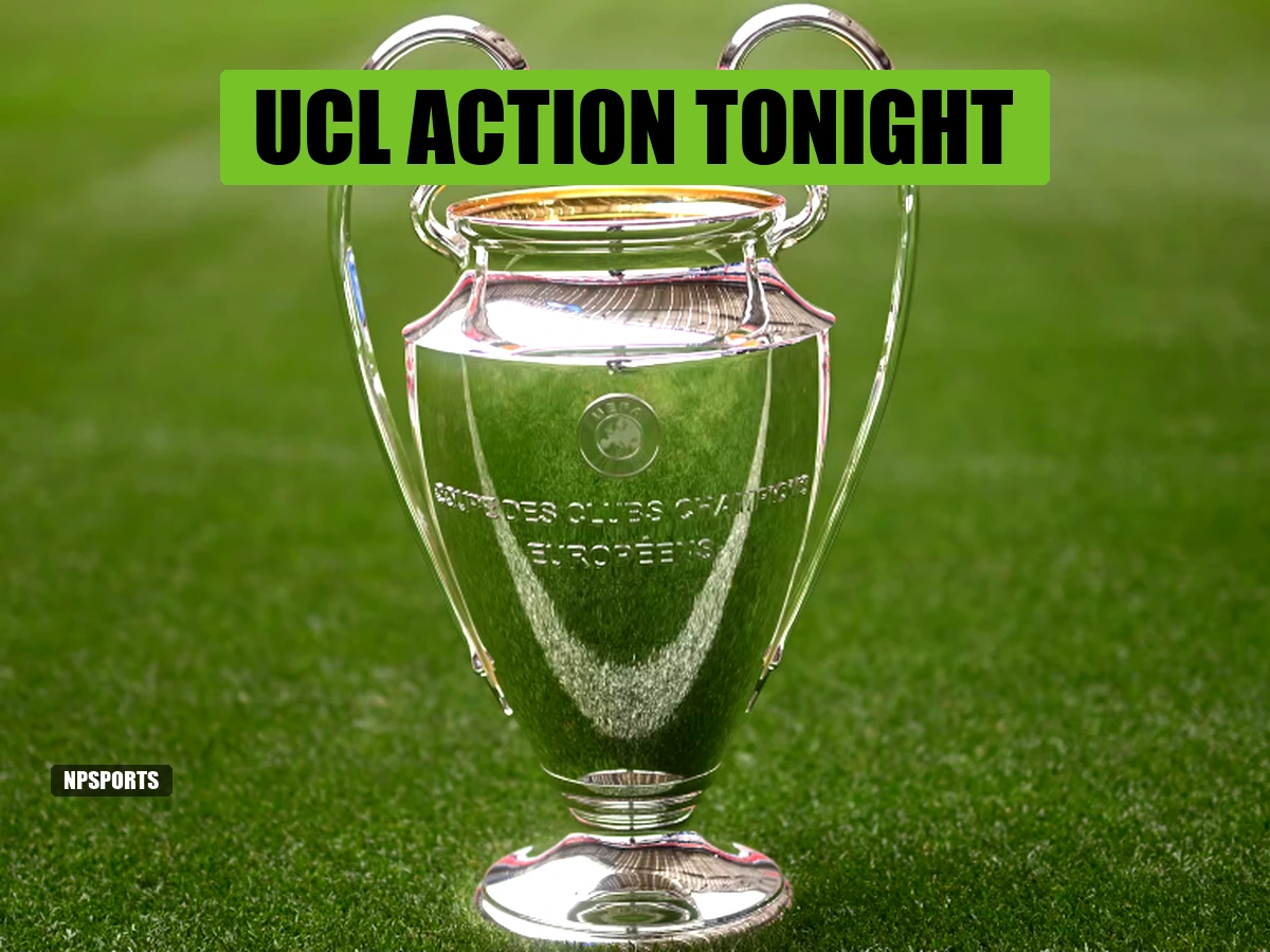 UEFA Champions League trophy displayed on pitch ahead of Matchday 2 action featuring Arsenal and Manchester United